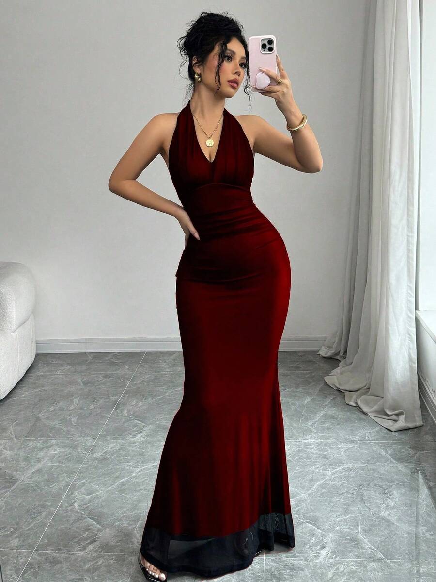 Women's long sleeve mermaid bodycon dress in high-stretch mesh fabric featuring a halter backless neckline, ruched high waist, and slim fit silhouette for formal evening wear.