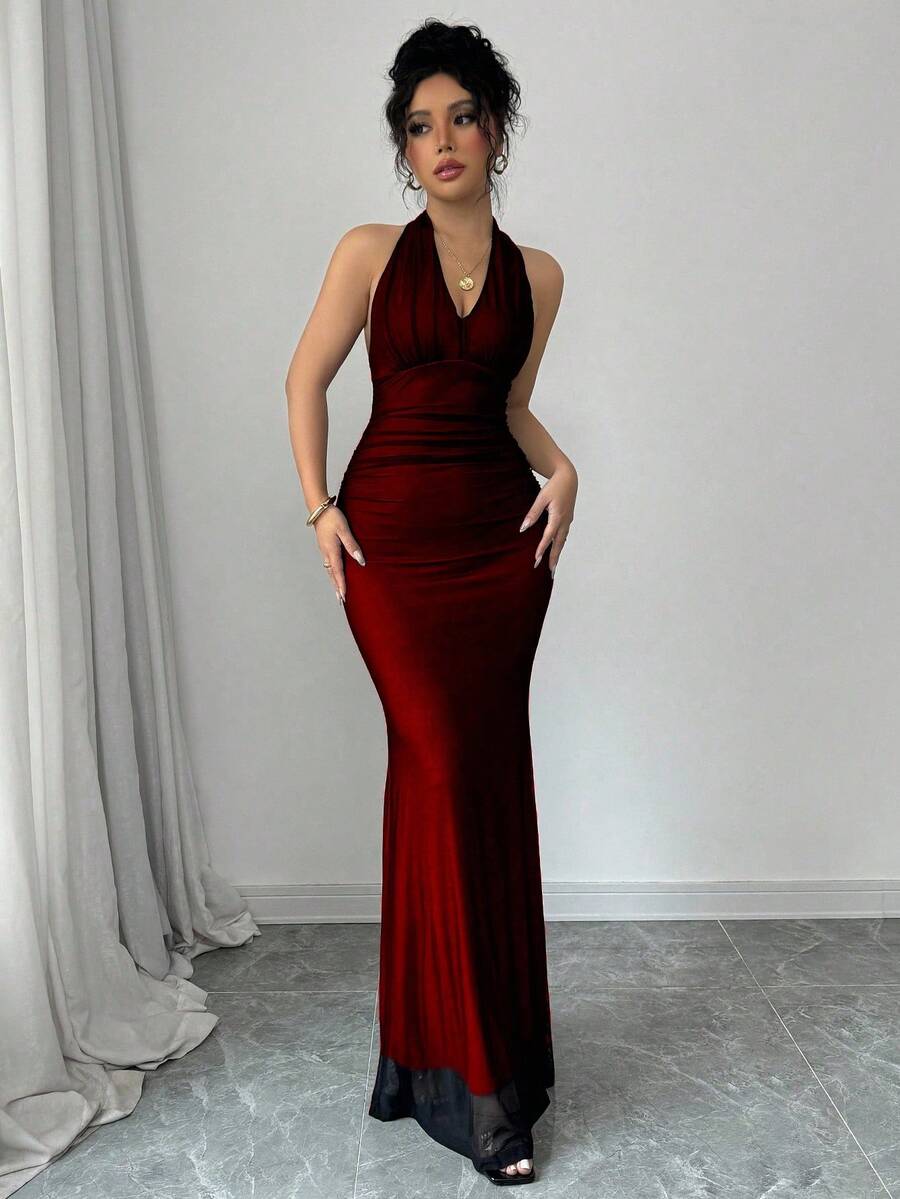 Women's long sleeve mermaid bodycon dress in high-stretch mesh fabric featuring a halter backless neckline, ruched high waist, and slim fit silhouette for formal evening wear.