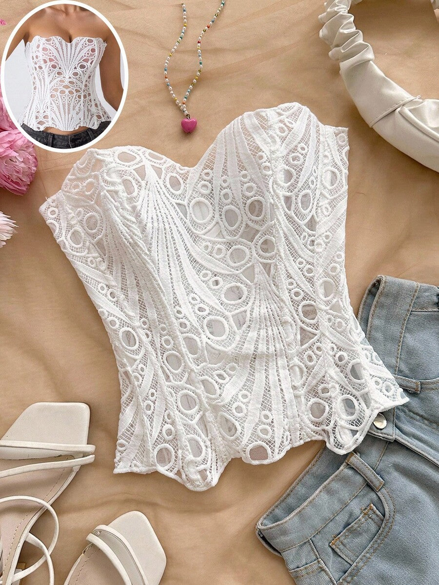 Women’s strapless corset bustier top with lace-up detail, asymmetrical embroidery, semi-sheer finish, and slim fit.