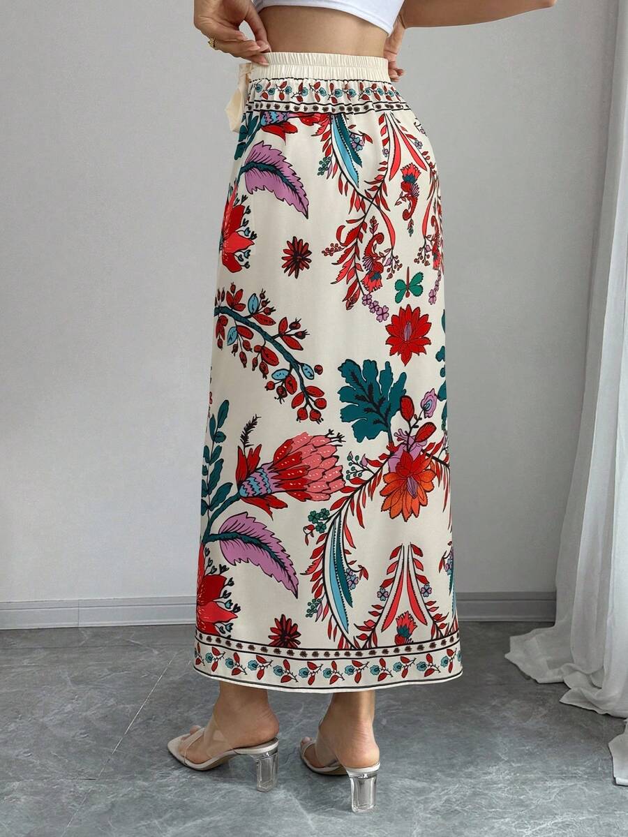 women's multicolor floral print wrap skirt featuring a high-waisted tie belt, A-line long silhouette, and boho woven fabric.
