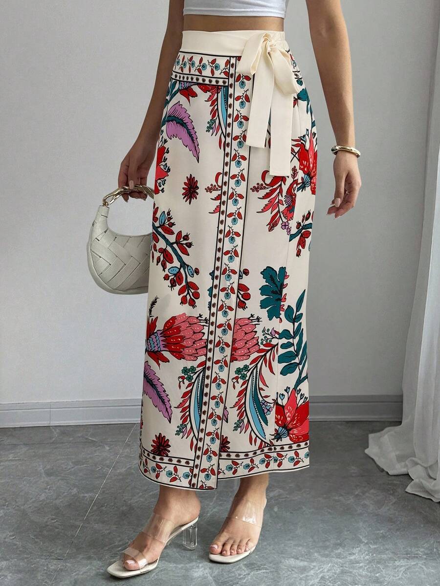 women's multicolor floral print wrap skirt featuring a high-waisted tie belt, A-line long silhouette, and boho woven fabric.