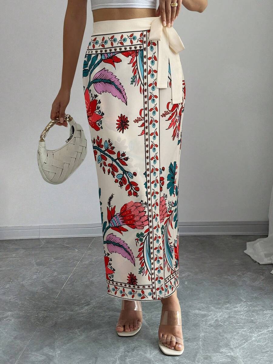 women's multicolor floral print wrap skirt featuring a high-waisted tie belt, A-line long silhouette, and boho woven fabric.