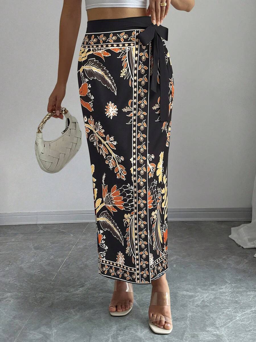 women's multicolor floral print wrap skirt featuring a high-waisted tie belt, A-line long silhouette, and boho woven fabric.