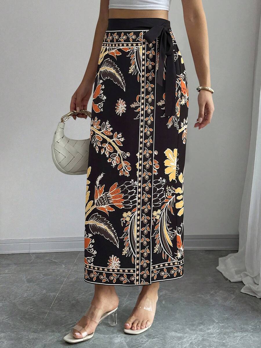 women's multicolor floral print wrap skirt featuring a high-waisted tie belt, A-line long silhouette, and boho woven fabric.