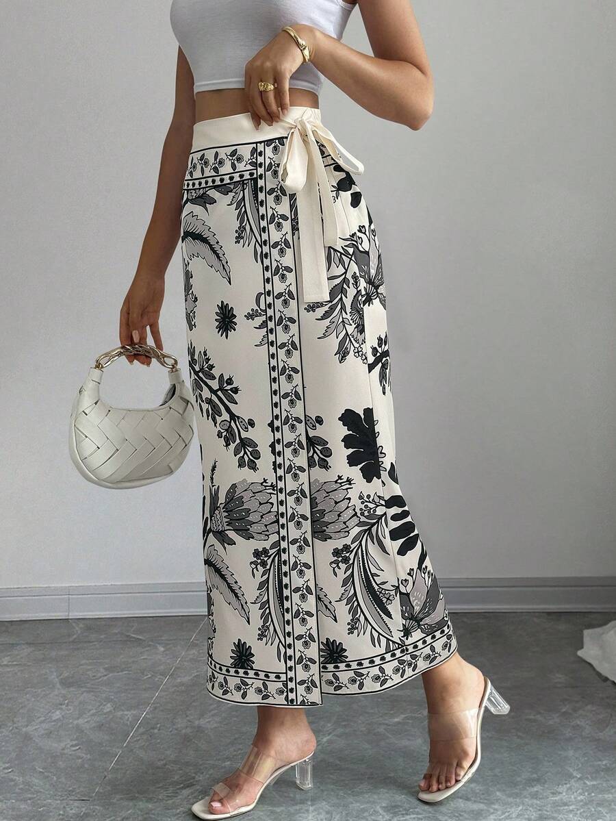 women's multicolor floral print wrap skirt featuring a high-waisted tie belt, A-line long silhouette, and boho woven fabric.
