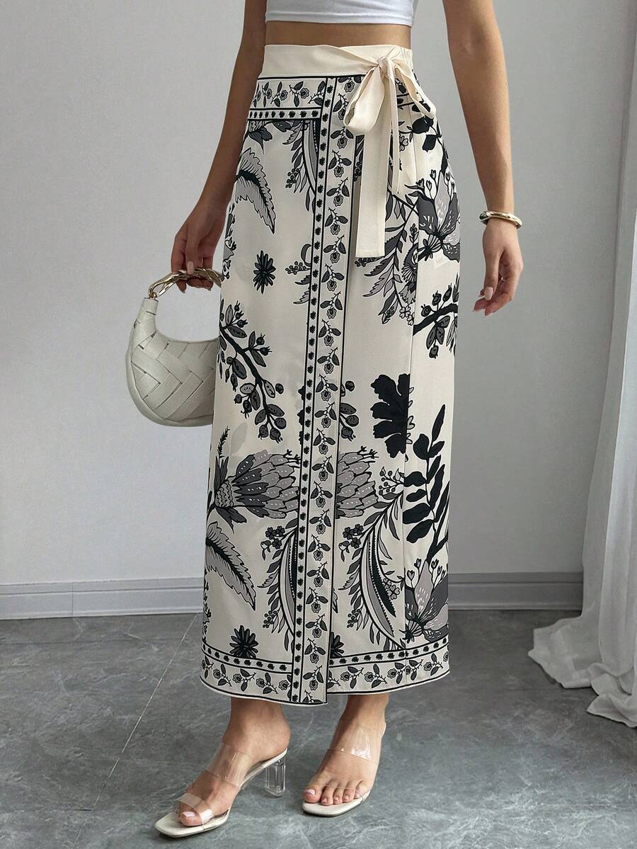 women's multicolor floral print wrap skirt featuring a high-waisted tie belt, A-line long silhouette, and boho woven fabric.