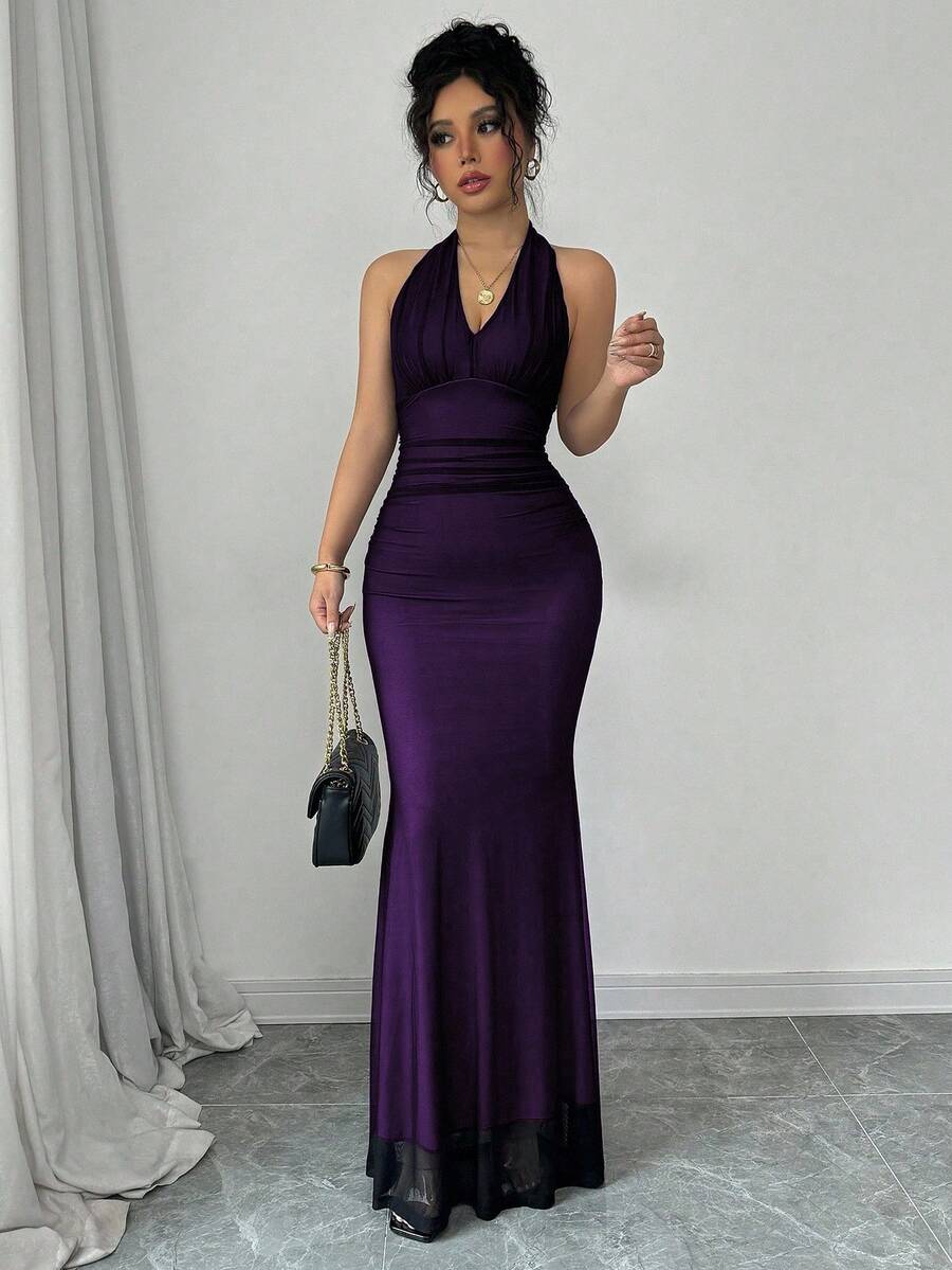 Women's long sleeve mermaid bodycon dress in high-stretch mesh fabric featuring a halter backless neckline, ruched high waist, and slim fit silhouette for formal evening wear.