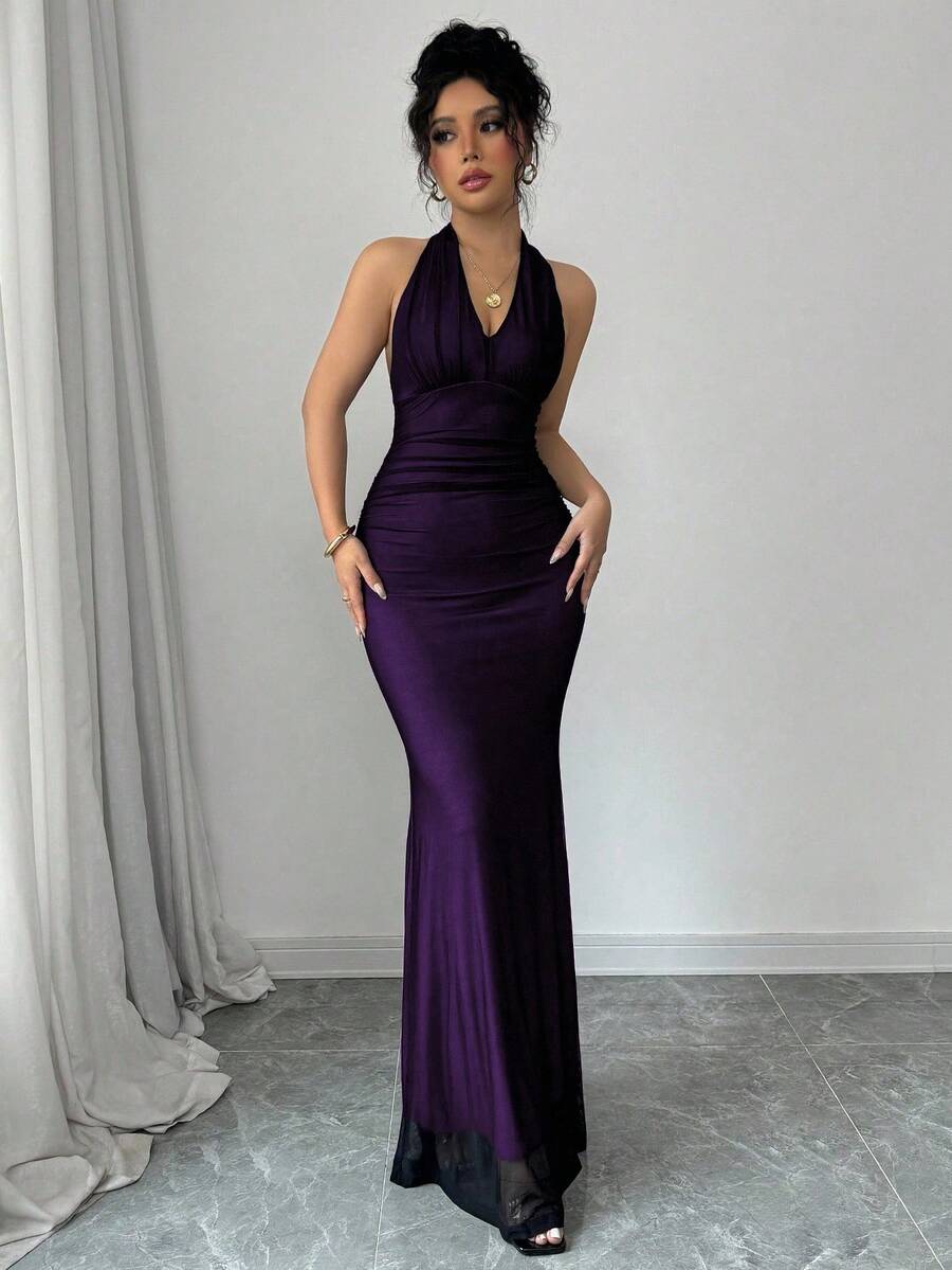 Women's long sleeve mermaid bodycon dress in high-stretch mesh fabric featuring a halter backless neckline, ruched high waist, and slim fit silhouette for formal evening wear.