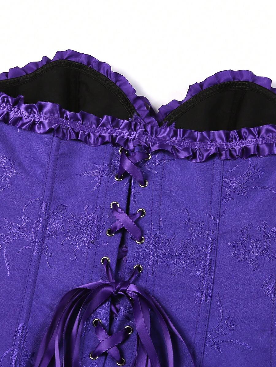 Women’s strapless corset bustier top with front button detail, lace-up back, frill accents, slim fit, and asymmetrical hem.