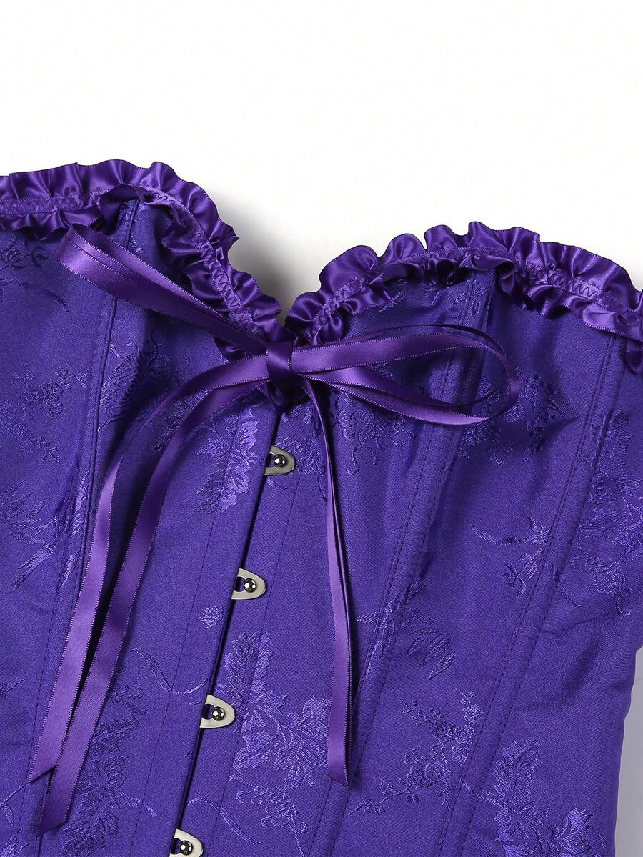Women’s strapless corset bustier top with front button detail, lace-up back, frill accents, slim fit, and asymmetrical hem.