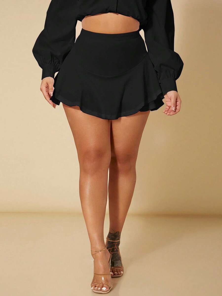 Black high waist ruffle hem skort for women featuring an elastic waistband and lined design.