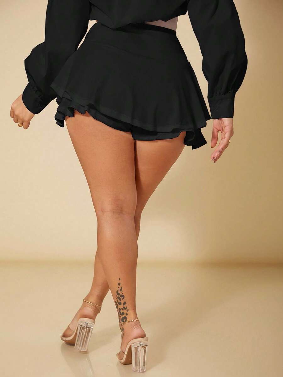 Black high waist ruffle hem skort for women featuring an elastic waistband and lined design.