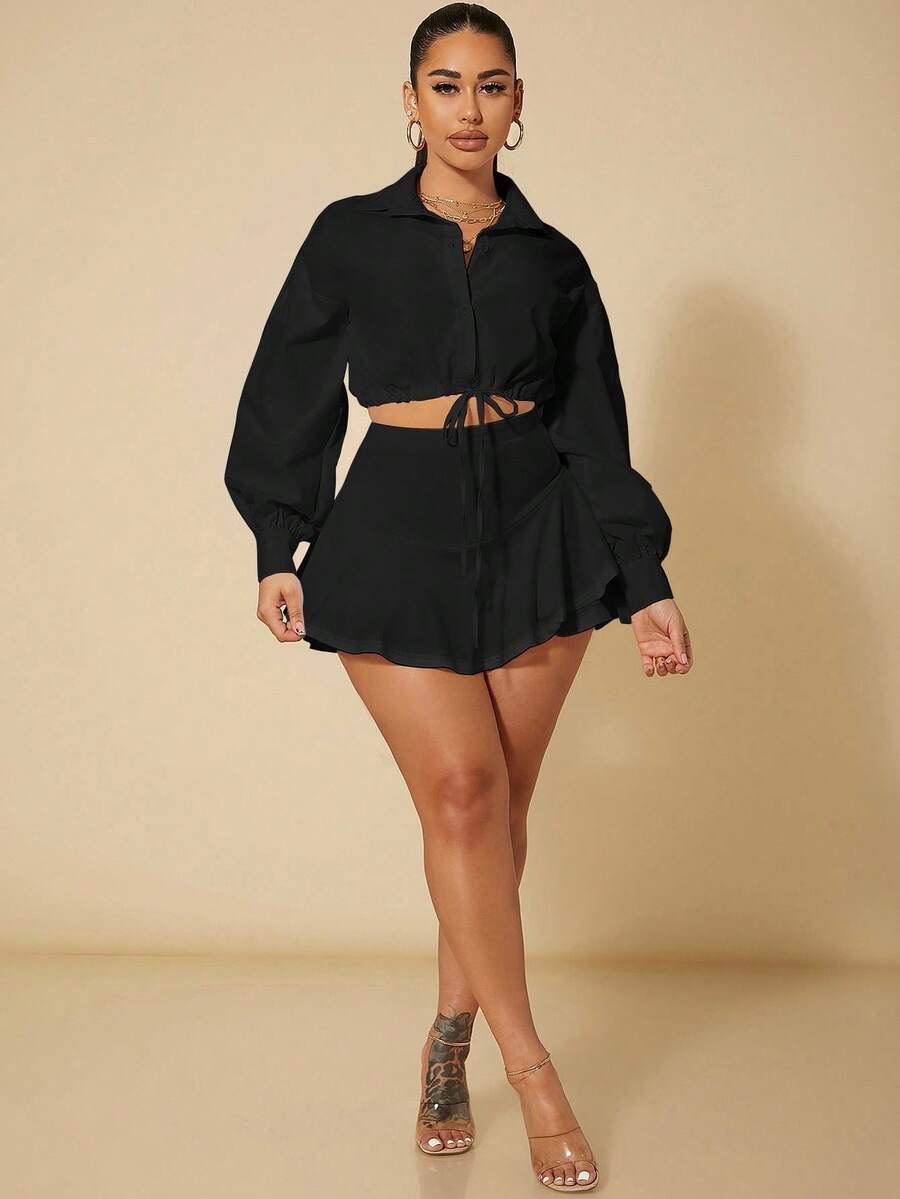 Black high waist ruffle hem skort for women featuring an elastic waistband and lined design.