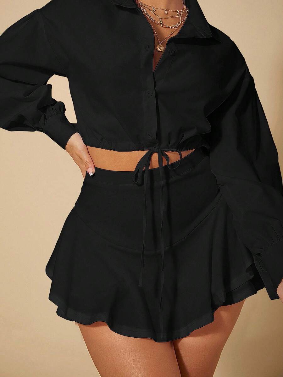 Black high waist ruffle hem skort for women featuring an elastic waistband and lined design.