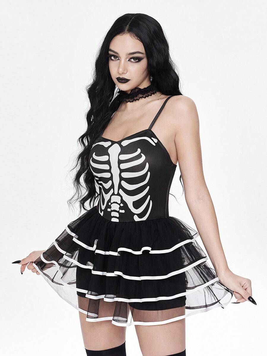 Women wearing a black goth skeleton mesh suspender mini cake dress featuring tiered ruffle hem, spaghetti straps, high waist slim fit, and matching arm sleeves.