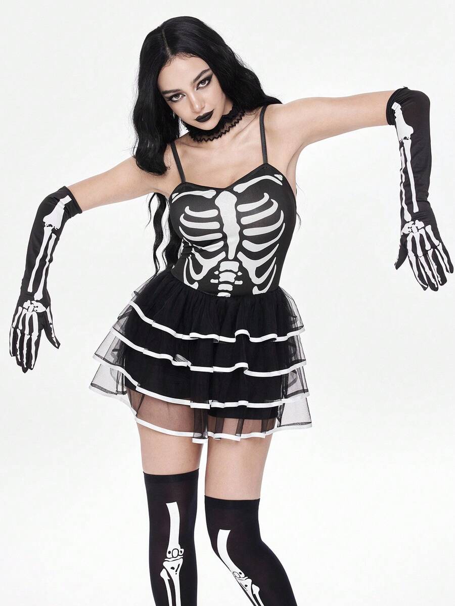 Women wearing a black goth skeleton mesh suspender mini cake dress featuring tiered ruffle hem, spaghetti straps, high waist slim fit, and matching arm sleeves.