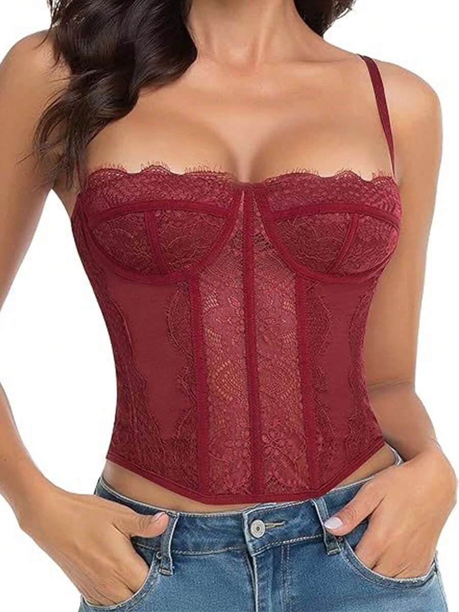 Black lace bustier corset top for women with buckle detail, spaghetti straps, slim fit, and lightweight mesh fabric for a night out look.