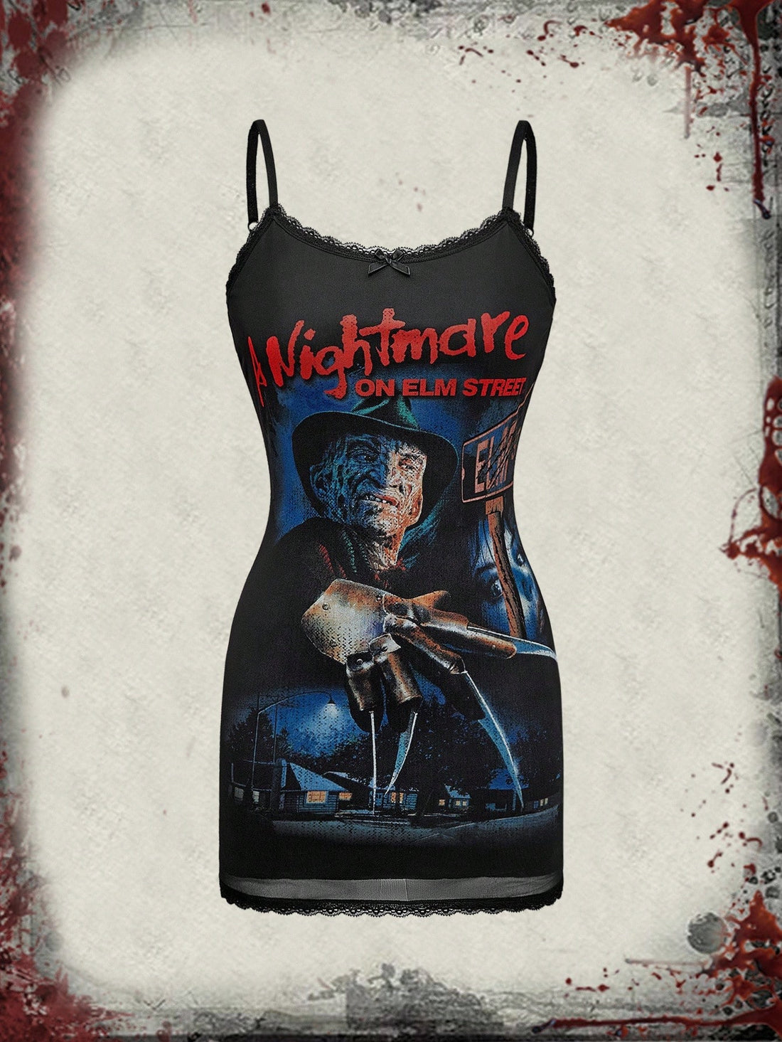 Women's black mesh patchwork cami mini dress featuring a figure graphic print, cut out details, and spaghetti straps.