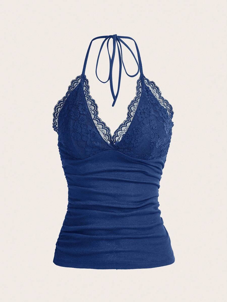 A women's black backless halter top featuring contrast lace trim, ruched front detail, and slim fit soft knitted fabric.