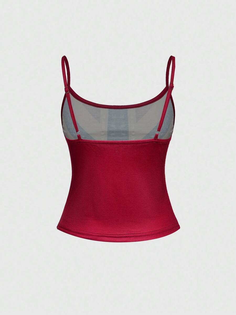 Black spaghetti strap crop camisole top for women featuring a vintage UK flag print with rhinestone and rivet details.
