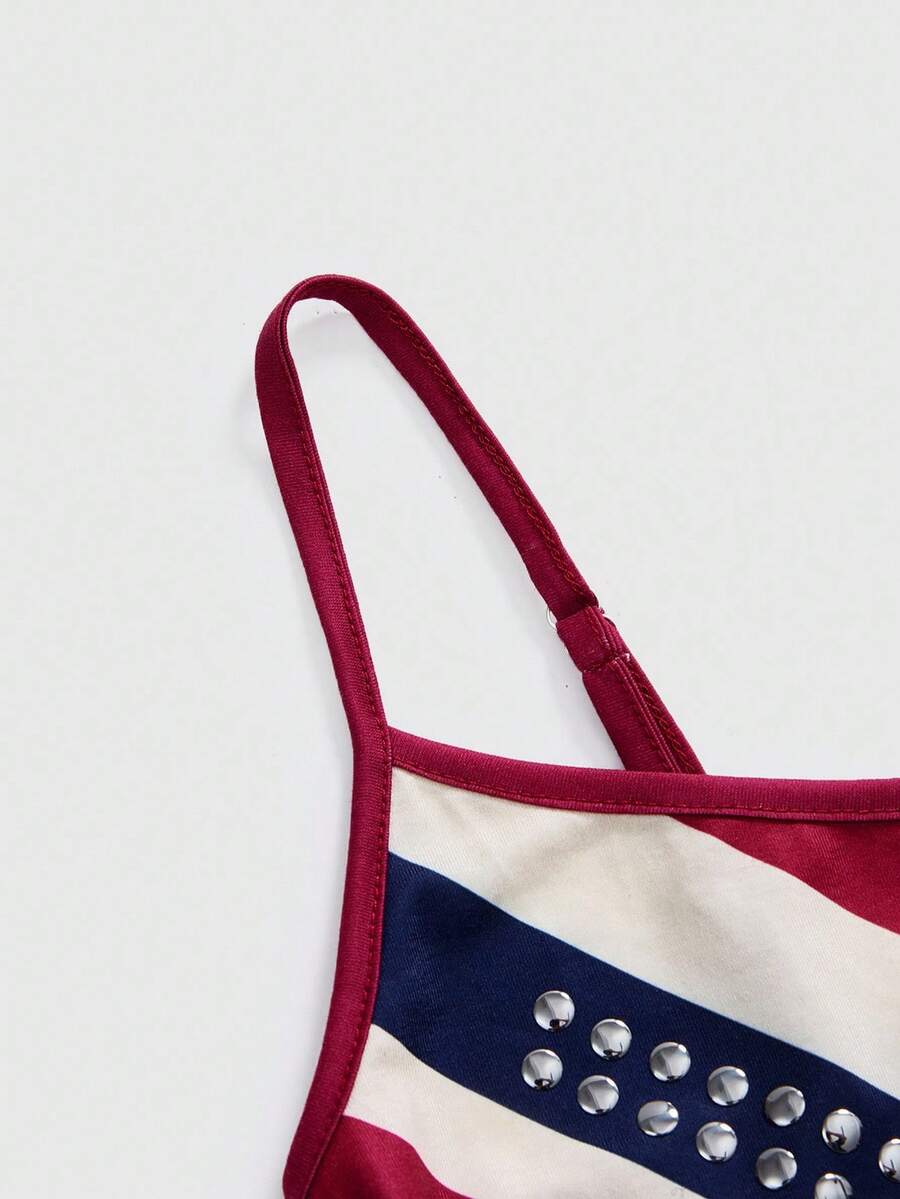 Black spaghetti strap crop camisole top for women featuring a vintage UK flag print with rhinestone and rivet details.