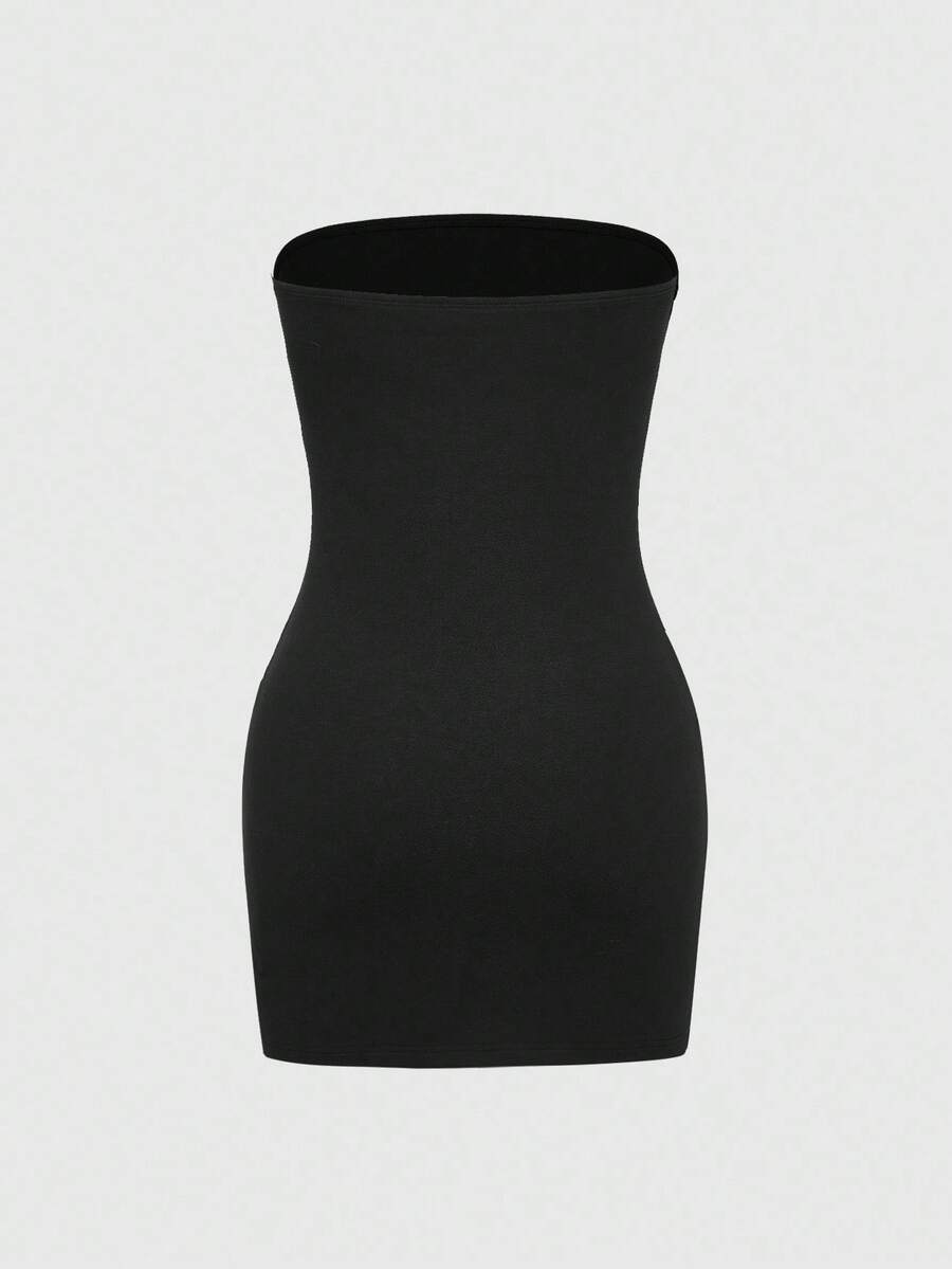 Black strapless backless bodycon mini dress for women featuring a Halloween skeleton print with rhinestone details.