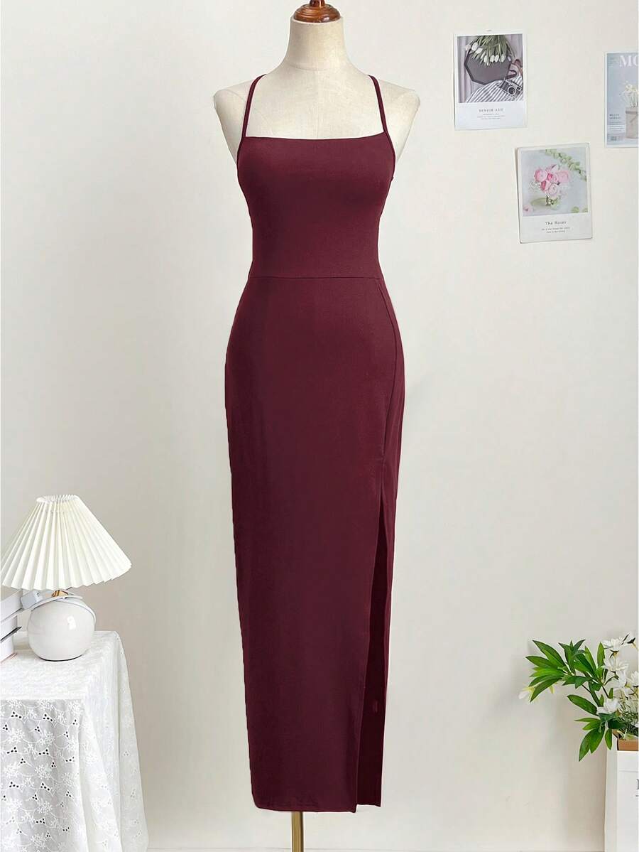 Women's backless sleeveless midi party dress with spaghetti straps and a high slit