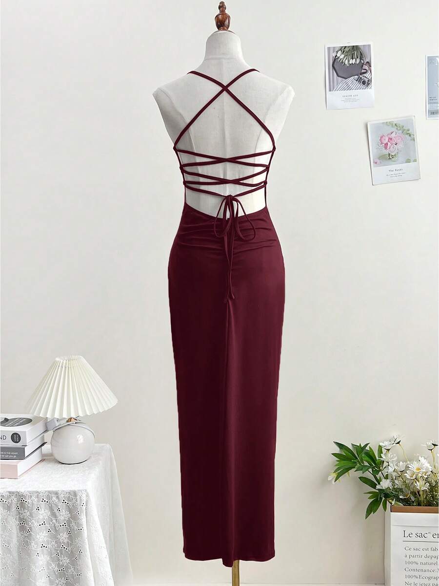 Women's backless sleeveless midi party dress with spaghetti straps and a high slit
