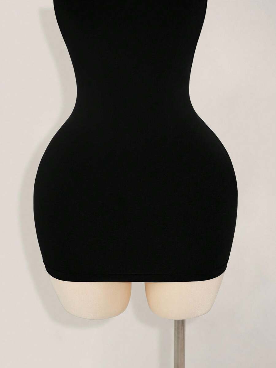 Apricot criss-cross backless bodycon mini dress for women featuring a round neck and rhinestone accent details.