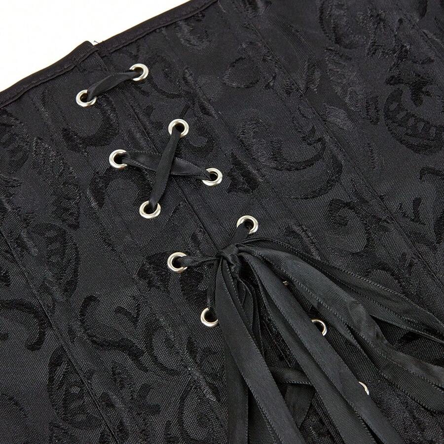 Vintage women’s waist cincher corset belt with lace-up and grommet eyelet details, slight stretch, and bow buckle for styling or costume wear.