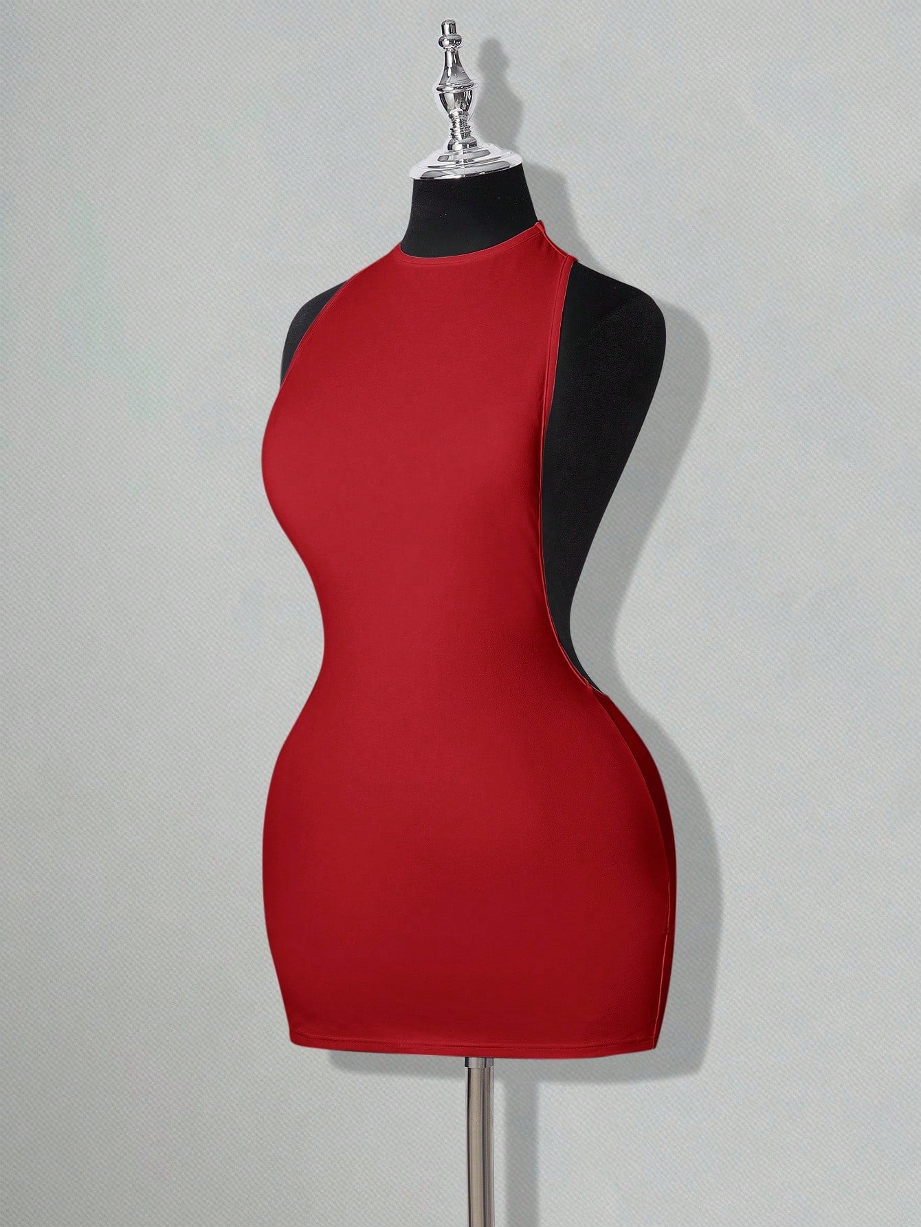 Apricot criss-cross backless bodycon mini dress for women featuring a round neck and rhinestone accent details.