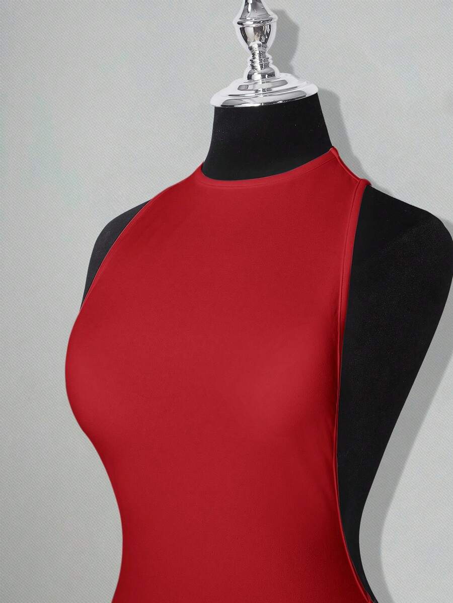 Apricot criss-cross backless bodycon mini dress for women featuring a round neck and rhinestone accent details.