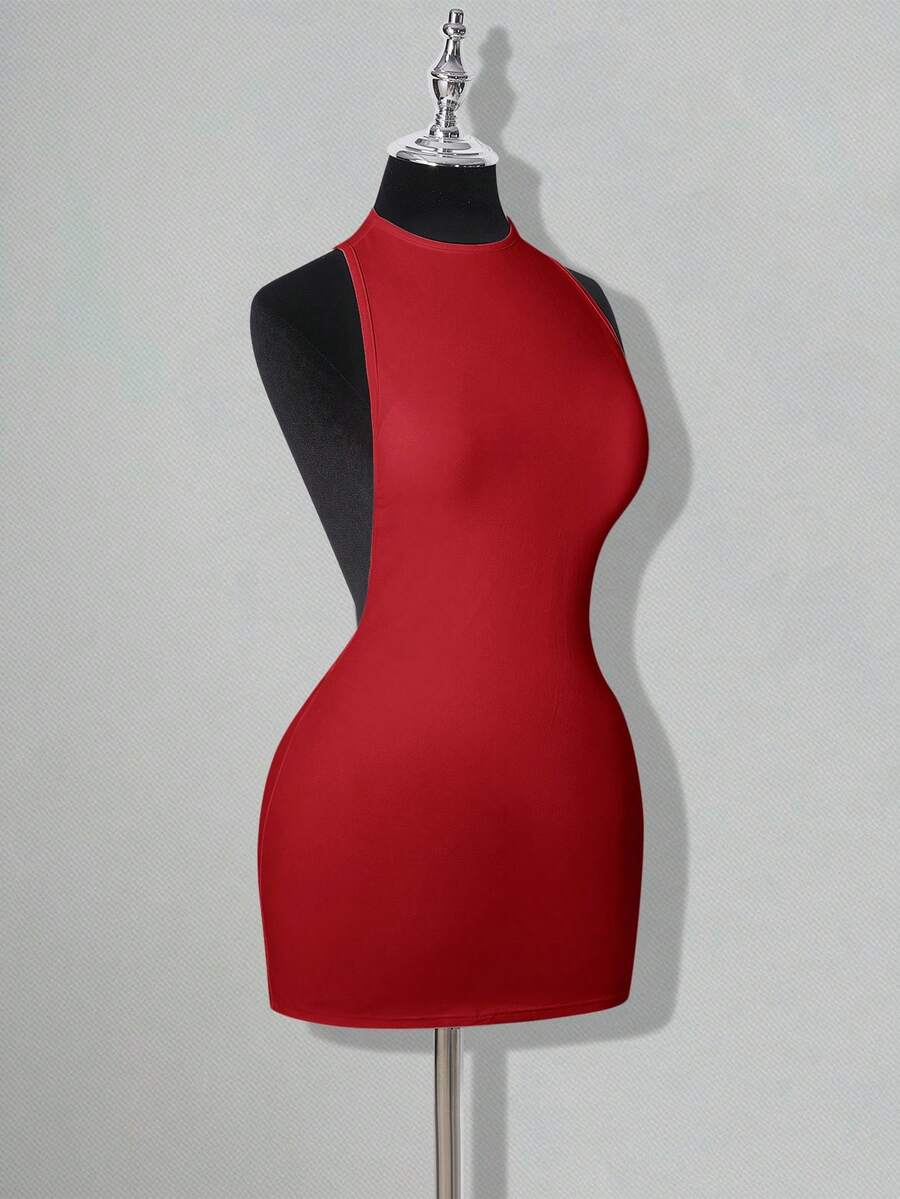 Apricot criss-cross backless bodycon mini dress for women featuring a round neck and rhinestone accent details.