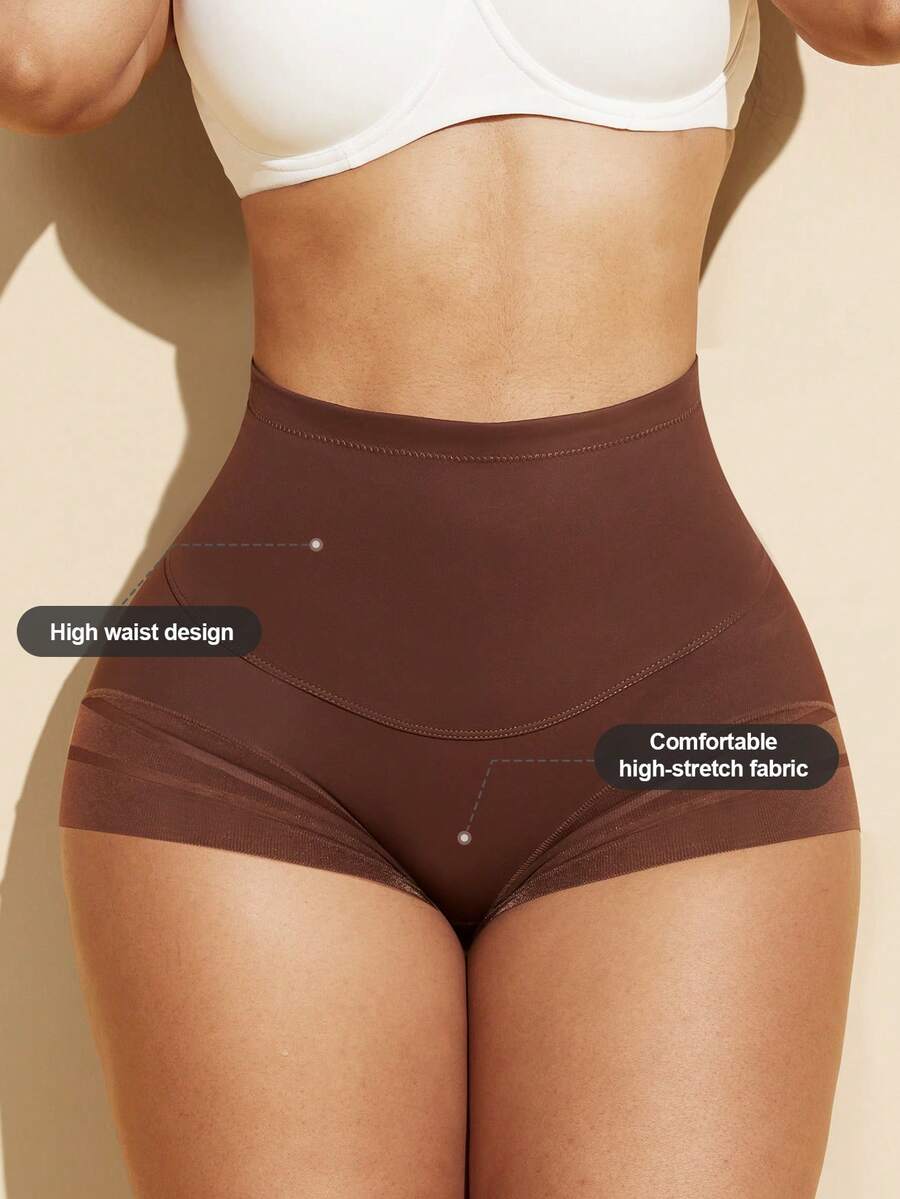 Black high waist shaping panties with striped mesh detailing and ultra light tummy control support for women.