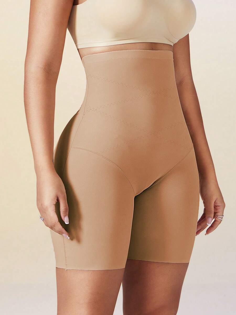 Women's high waist seamless shapewear shorts featuring strong tummy control and high stretch compression.
