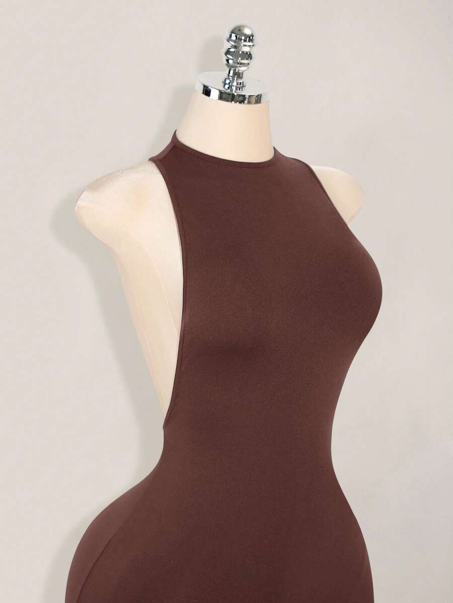 Apricot criss-cross backless bodycon mini dress for women featuring a round neck and rhinestone accent details.