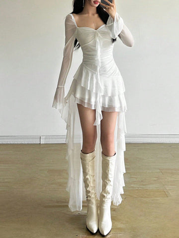 Woman wearing a solid off-the-shoulder asymmetrical midi dress with long flare sleeves.