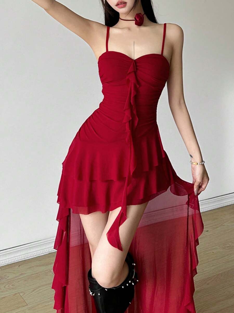 Women's white off shoulder asymmetrical camisole midi dress featuring a fitted high waist and sleeveless knitted design.