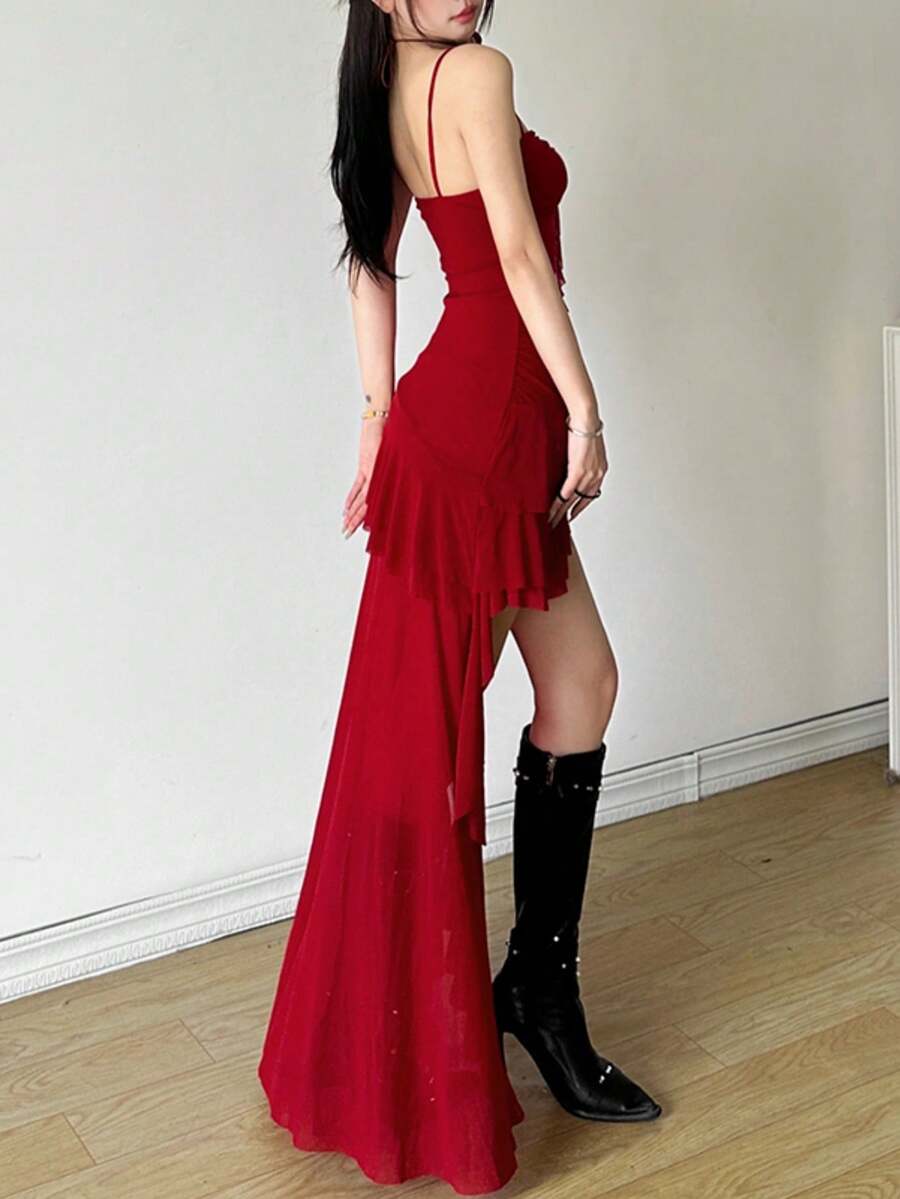 Women's white off shoulder asymmetrical camisole midi dress featuring a fitted high waist and sleeveless knitted design.