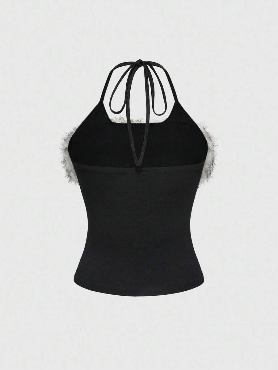 Black graphic print halter cami top featuring contrast faux fur trim, spaghetti straps, backless design, and micro crop fit.