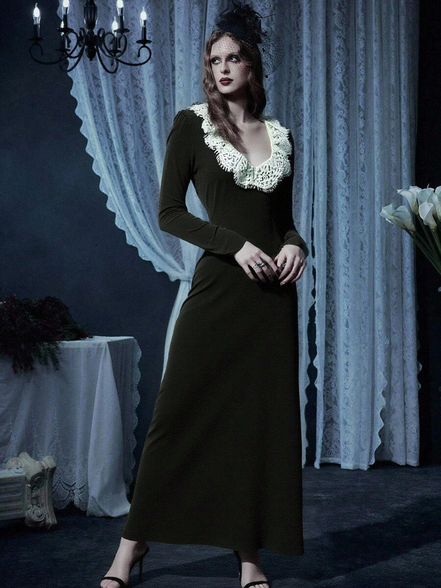 Black velvet gothic dress for women featuring contrast lace trim, sweetheart neckline, long sleeves, and a flared high waist silhouette.
