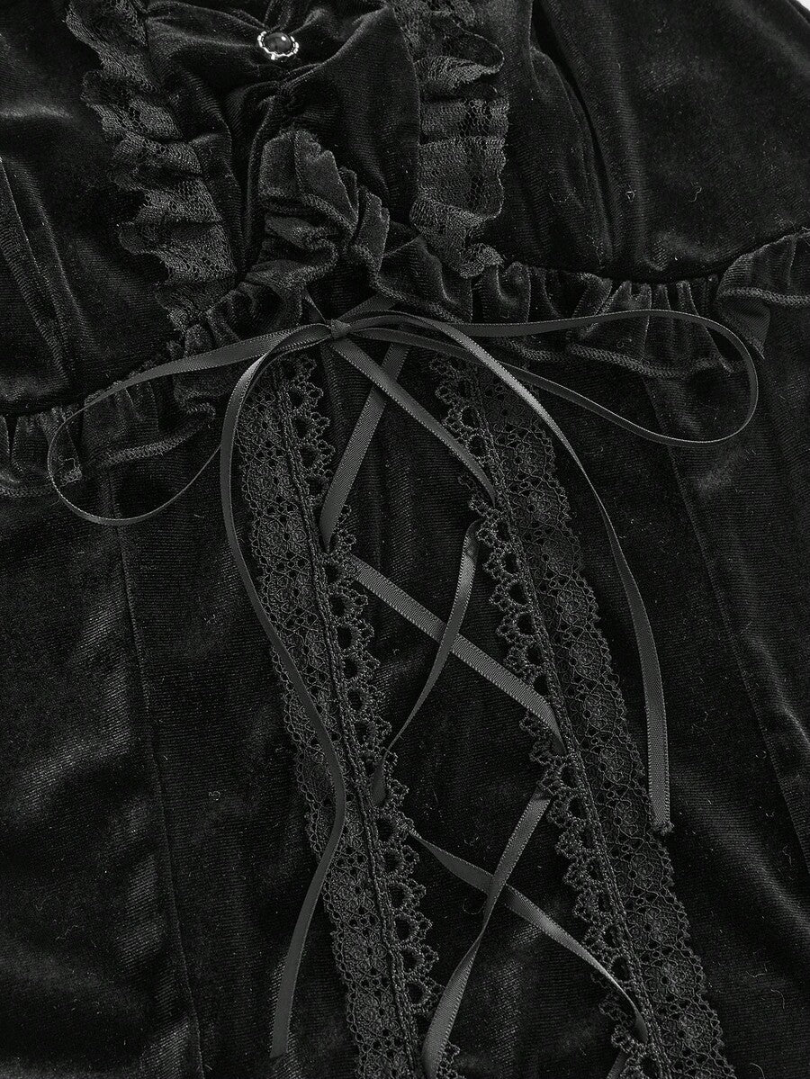 Women's black lace patchwork crop camisole with spaghetti straps, backless design, and tie-up front details.