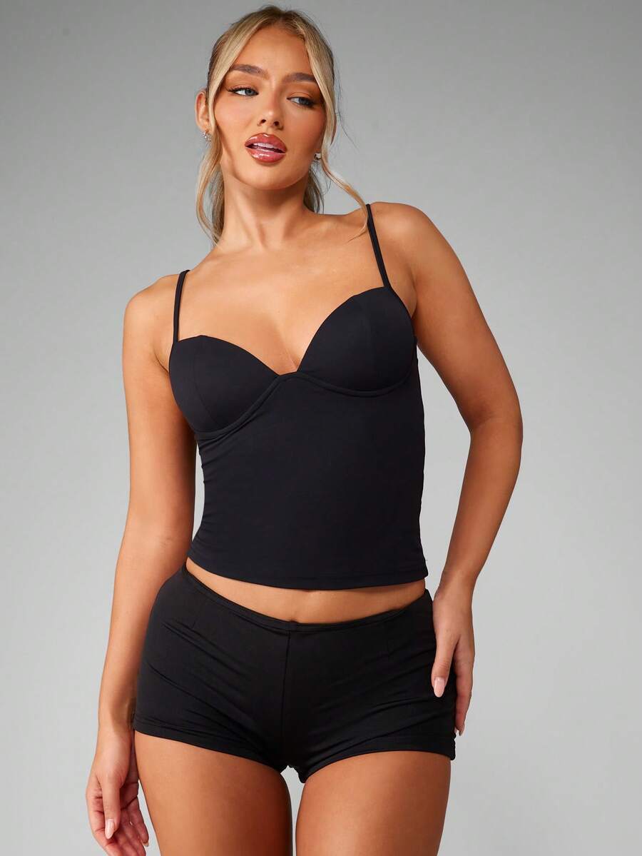 Women’s plain backless cami top with spaghetti straps and a slim fit, designed in high-stretch knitted fabric for casual beach and vacation wear.