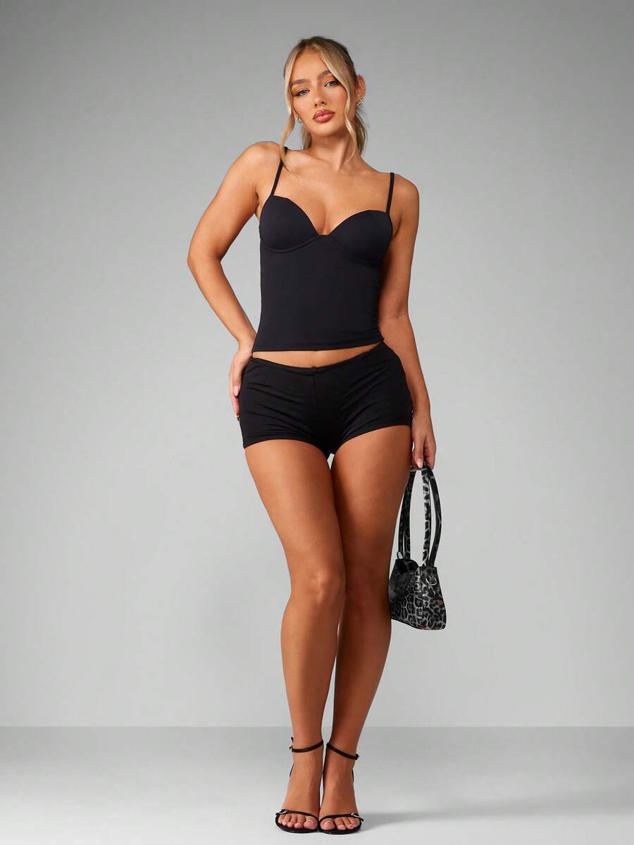 Women’s plain backless cami top with spaghetti straps and a slim fit, designed in high-stretch knitted fabric for casual beach and vacation wear.