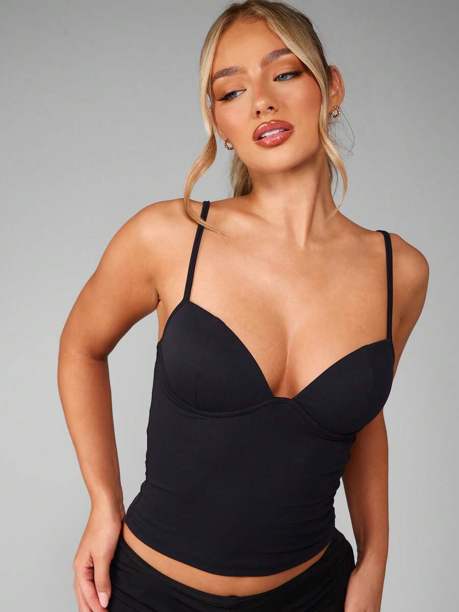 Women’s plain backless cami top with spaghetti straps and a slim fit, designed in high-stretch knitted fabric for casual beach and vacation wear.