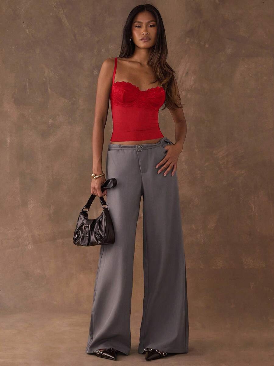 Women's black contrast lace camisole with spaghetti straps, cup detail, semi-sheer finish, and slim fit for going out or date night.