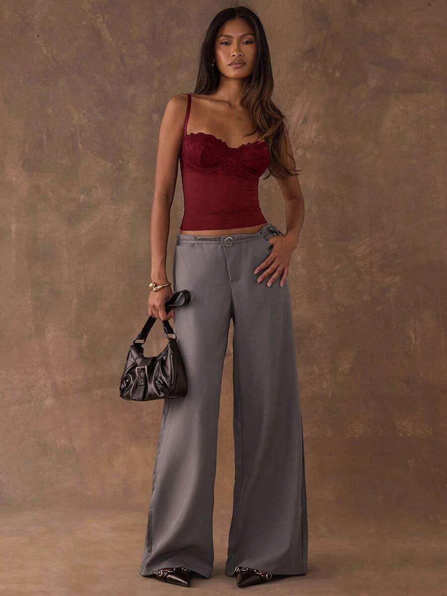 Women's black contrast lace camisole with spaghetti straps, cup detail, semi-sheer finish, and slim fit for going out or date night.