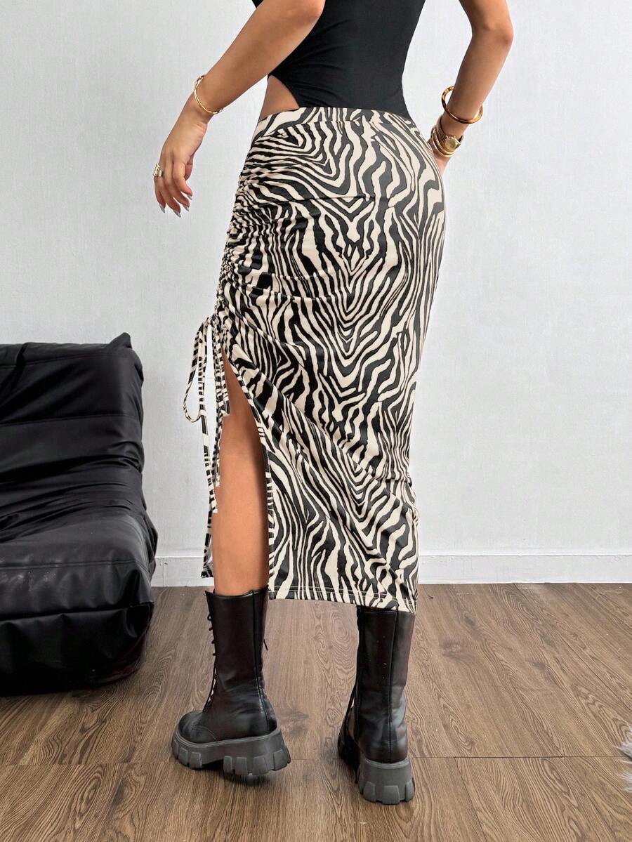 Khaki zebra print long skirt for women featuring side drawstring, ruched detailing, split thigh hem, and skinny mid-waist fit.
