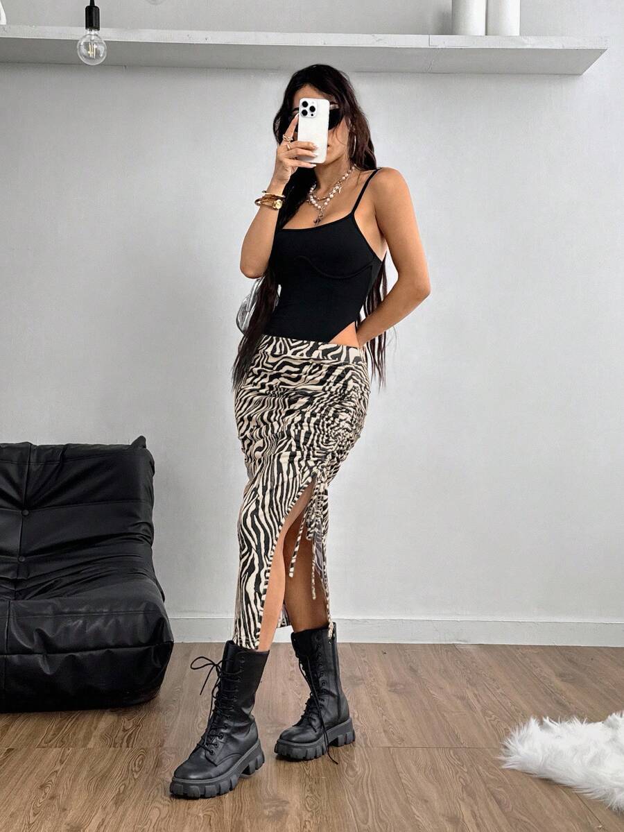 Khaki zebra print long skirt for women featuring side drawstring, ruched detailing, split thigh hem, and skinny mid-waist fit.