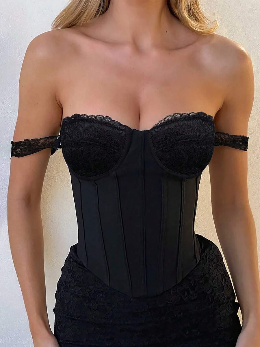 Women's black cropped bustier top featuring contrast lace detailing, off the shoulder neckline, boned waist cincher, and lace-up backless design.